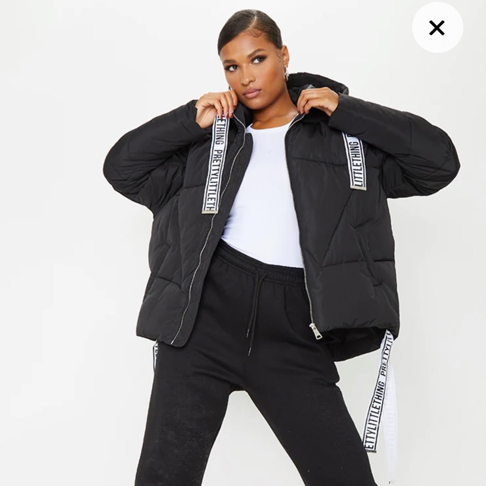 PrettyLittleThing Black oversized dripped hem puffer jacket